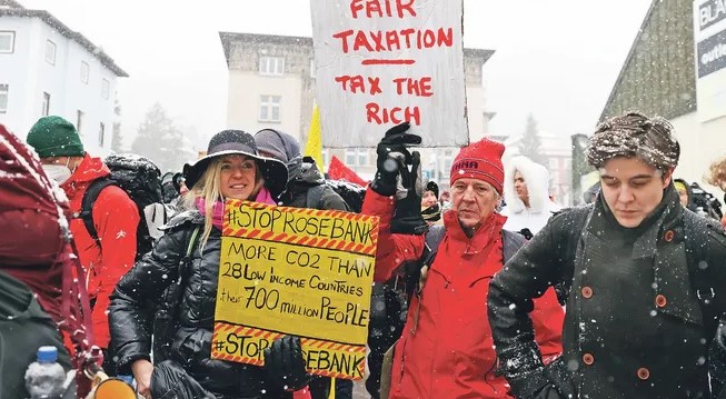 Ultra-rich urge Davos to 'Robin Hood' tax